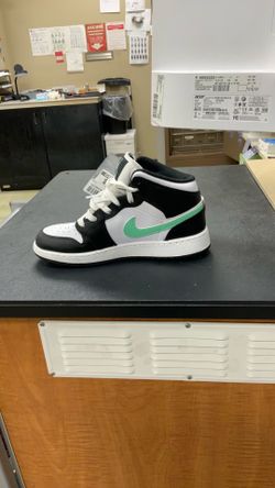 Black white and teal Nike