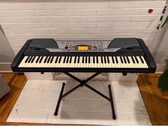 Yamaha keyboard piano & free stand