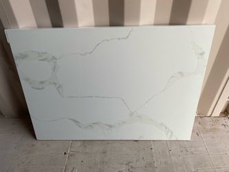 Quartz Countertop 25-3/4”x 36-1/2” with a 1.5” manufactured edge on the front