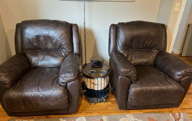 Two leather manual recliners