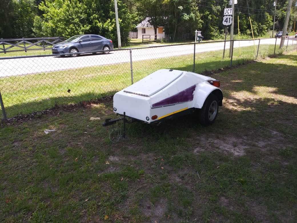 Motorcycle tow behind trailer/camper. 285 lbs.