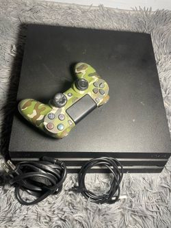 PS4 pro with controller and cables