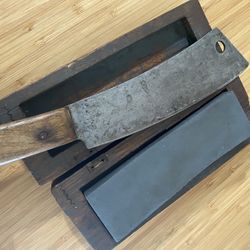 vintage meat cleaver and sharpening stone