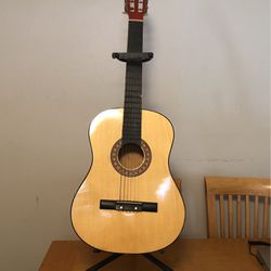 $50 Guitar For Sale  With Stand $50 Firm