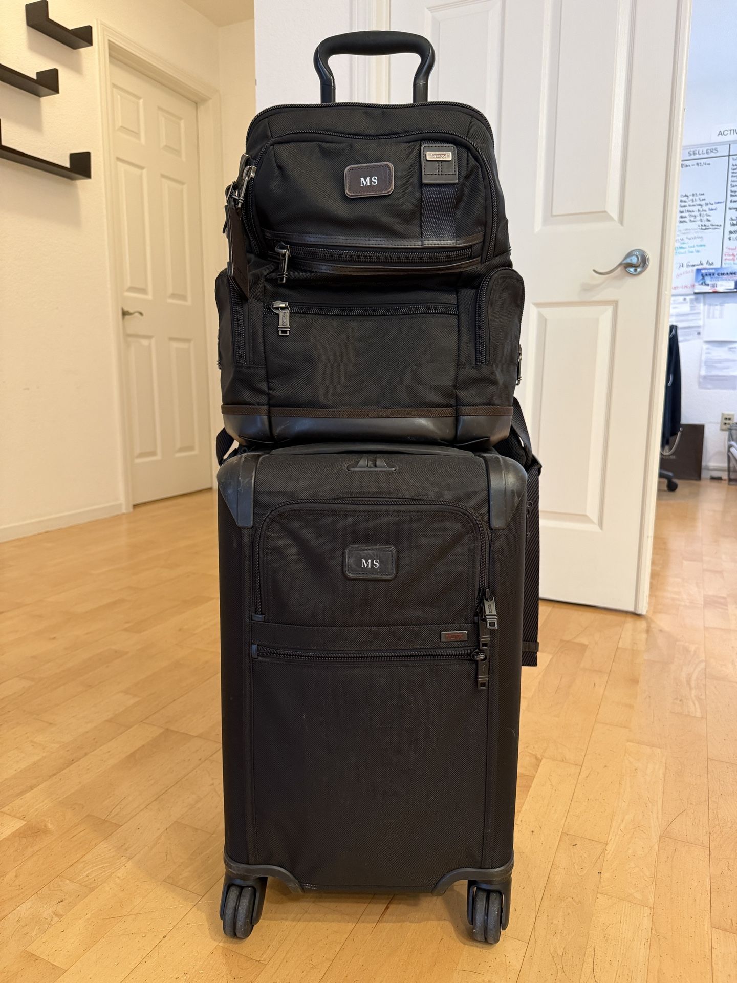 TUMI International Carry-On Roller + TUMI Backpack Set