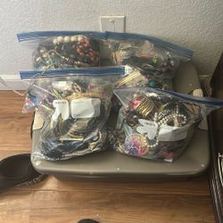4 large bags of random costume jewelry