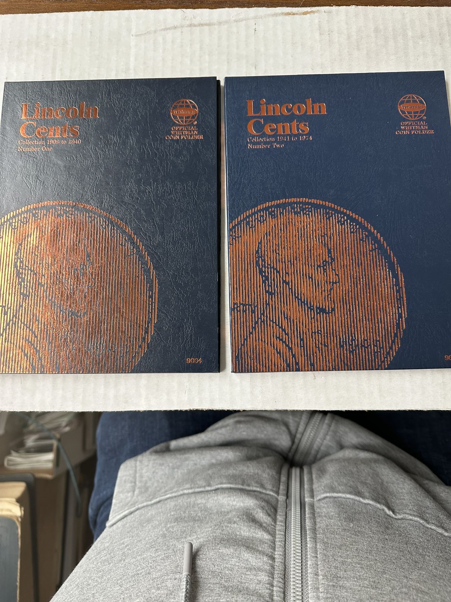 Lincoln Pennies Group Of 9 Ranging From 1910-40 Plus 2 Books