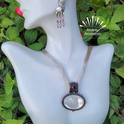 Sterling Silver 925 Necklace And Earrings Mother or Pearls and Ruby stone.