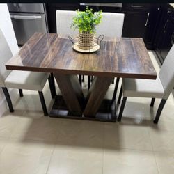 Dining table with 4 chairs. Normal use. $150