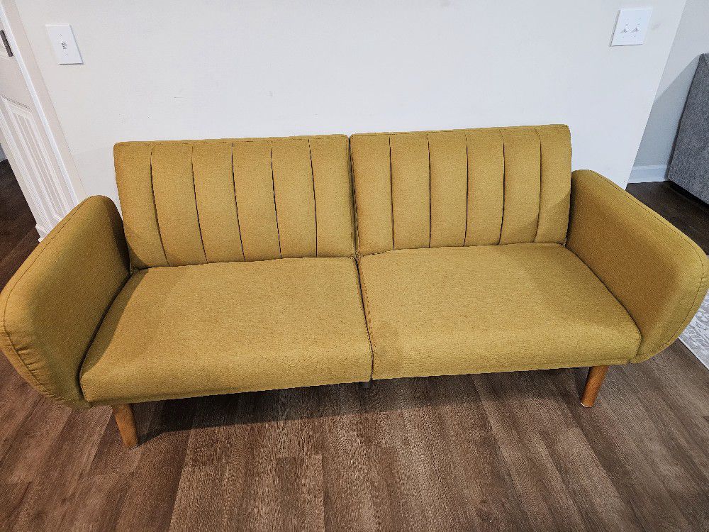 Used Mustard color futon. 