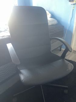 Used Black Rotating Chair with Arm Rests