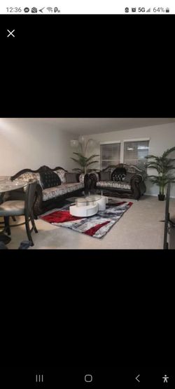 Ornate Darkwood Sofa and Loveseat