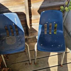 Two blue elementary school chairs for children. About 12" Above Ground. Good For Child's Table Also. East, west, north meet.