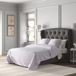 Tyne Upholstered Wingback Storage Bed