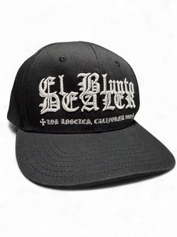 El Blunto Dealer Snapback Hat Black Old English Logo Cap Los Angeles California Streetwear Gothic Cap Black cotton twill snapback. Front: White puff