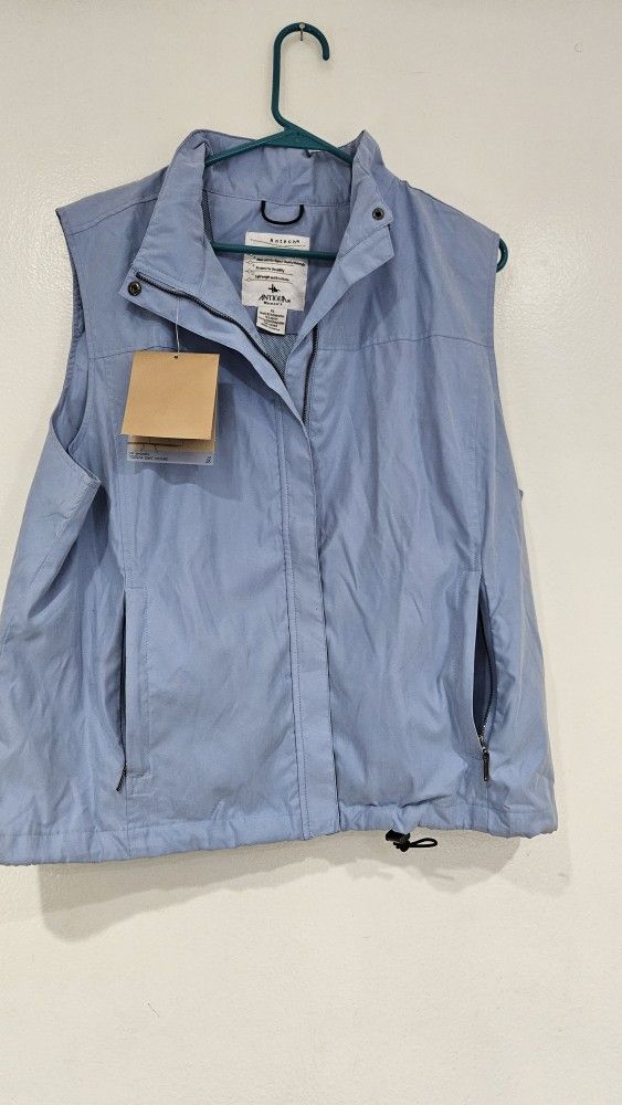Antigua women's light blue rain jacket vest.  Size XL