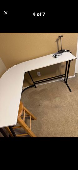 White L shape computer table like new $50 Gilbert and Ray rd. Check all pics and offers.