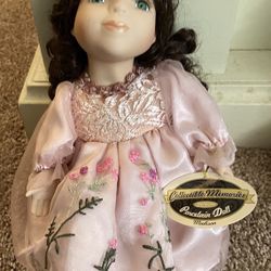 Musical porcelain Doll