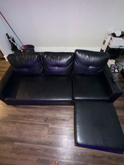 Black couch with ottoman