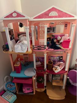 Barbie house, dolls, and tons of accessories