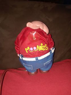 Novelty doll that moons people you can stick to your cars windows