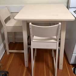 KEA RUNNINGE birch bar table with 2 NORDVIKEN bar chairs.