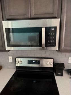 GE electric stove/oven, microwave and dishwasher set