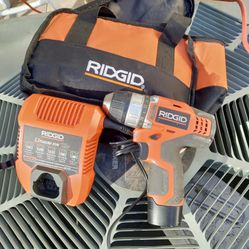 12 Volts Drill One Battery And A Charger