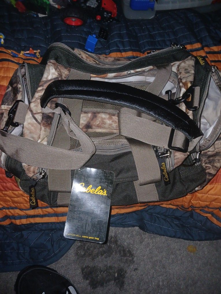 Brand New Cabelas Multi Pocket Duffle Bag!