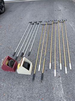 Large Set Shuffleboard Sticks and Pucks