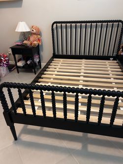 Wood full size bed from Crate and Barrel