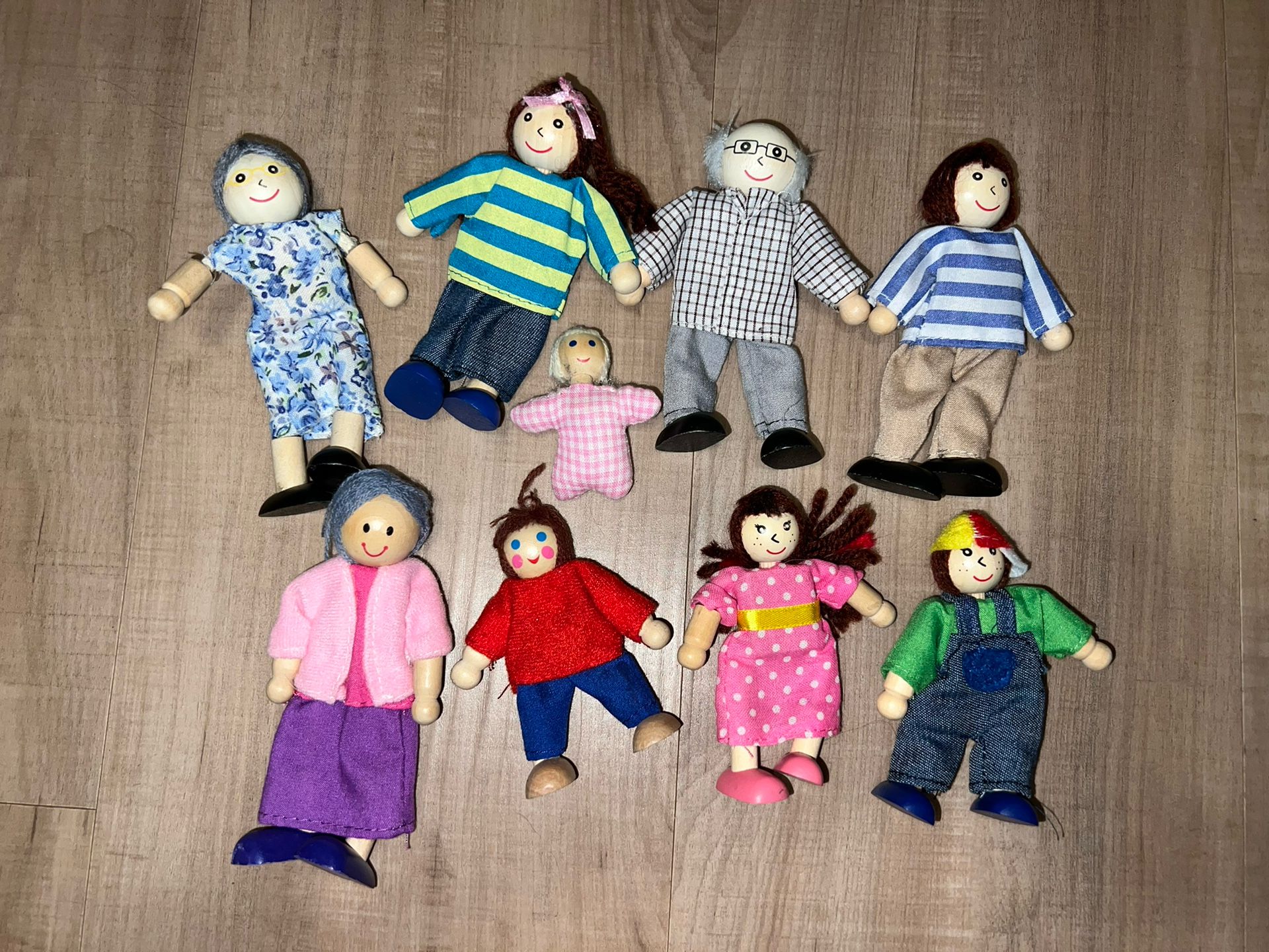Melissa & Doug Wooden Doll House Doll Family - Poseable Wood Dolls - Set of 9