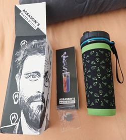 Brand New Assassin's Water Bottle with Sleeve - Never Used