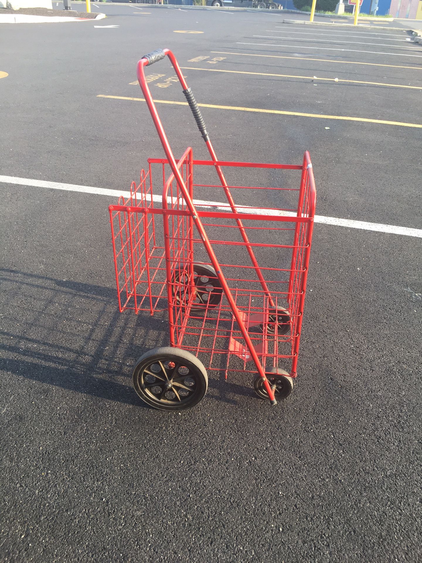 A GROCERY SHOPPING CART AND LAUNDRY CART WITH ACCESSORY BASKET USED IN GOOD CONDITION FOLDS FLAT $25.00
