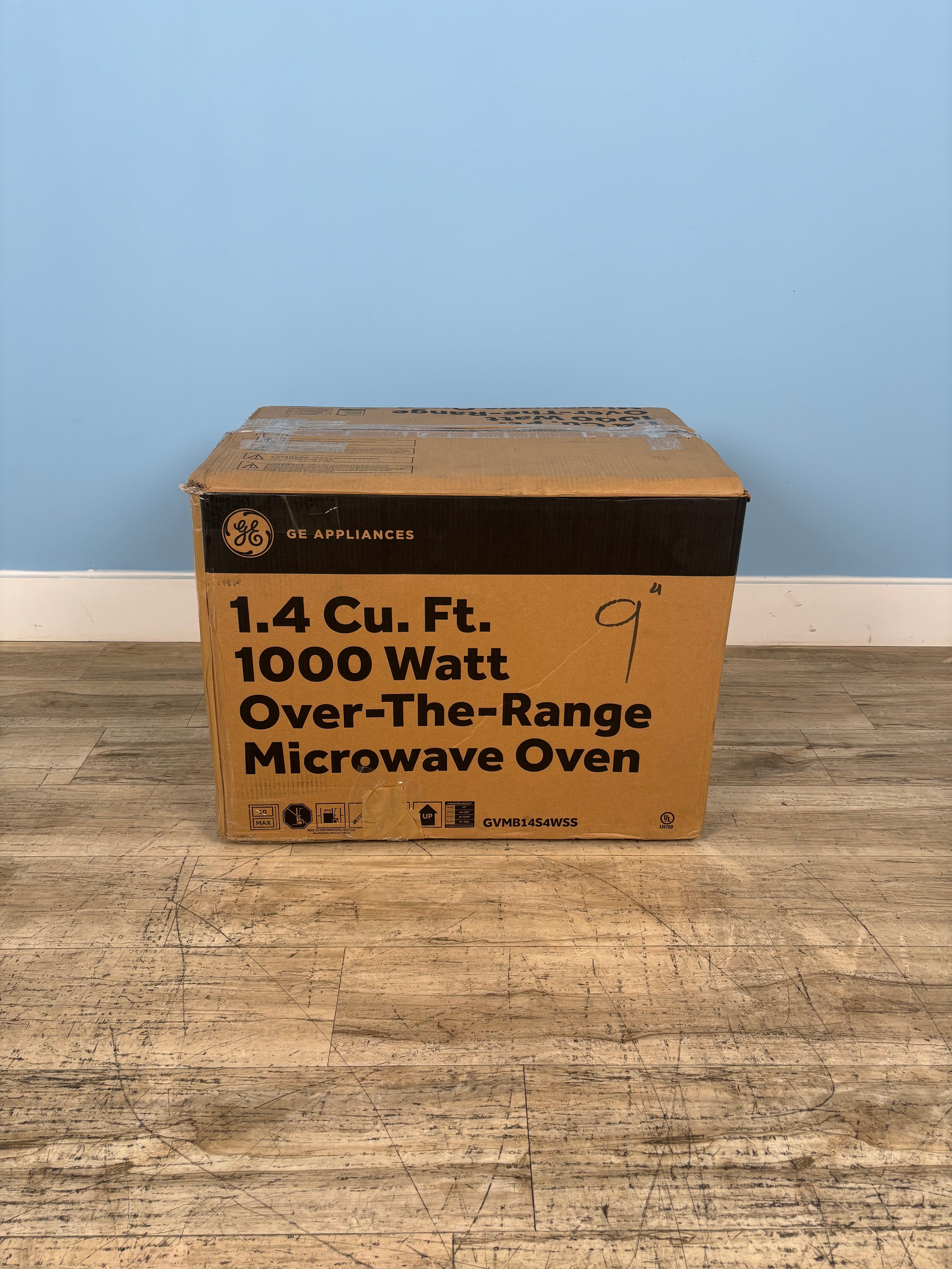 GE - 24 in. 1.4 cu. ft. Over-The-Range Microwave Oven in Stainless Steel with Sensor Cooking