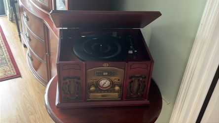 Old Victrola style replica with a set of matching end tables