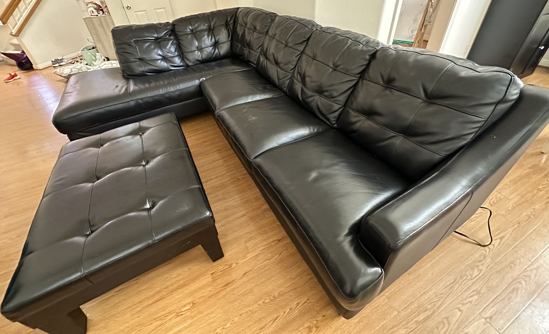 Black Leather Sectional Sofa + Ottoman with Storage Drawer - $400