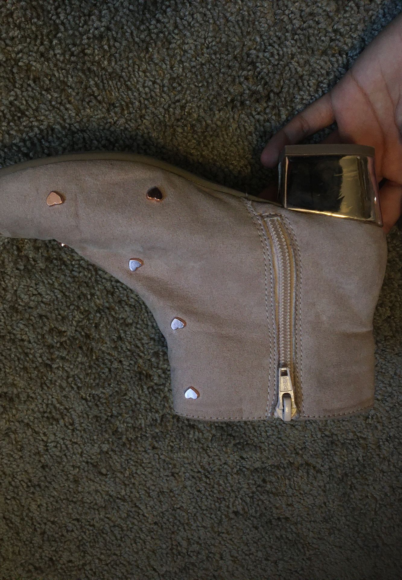 Children place girl shoes