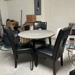 Mucuto Dining Table And Chairs Lightly Used!