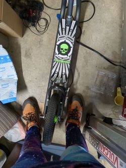Mongoose green scooter