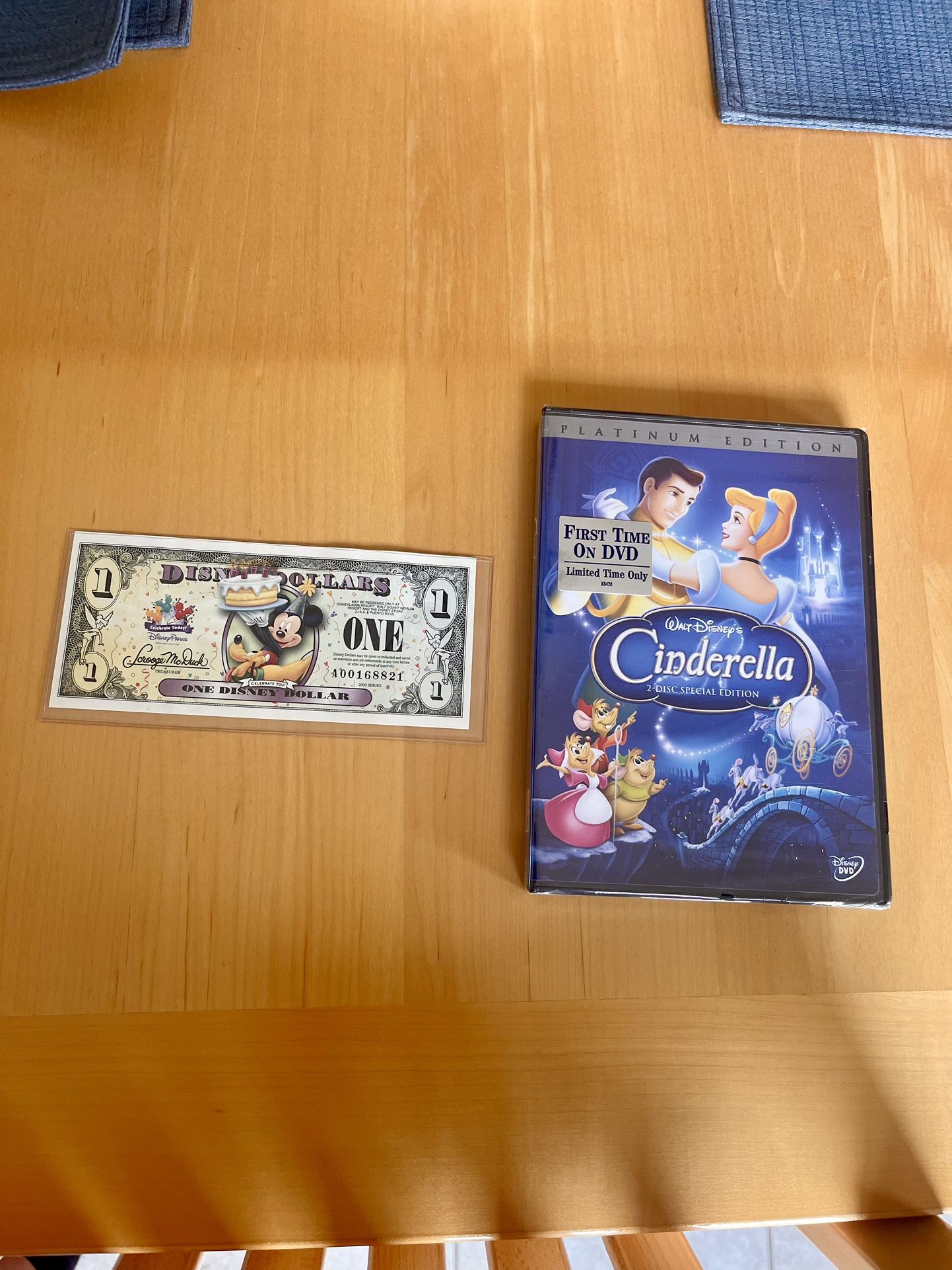 Collectable Disney Dollar & Sealed Cinderella DVD