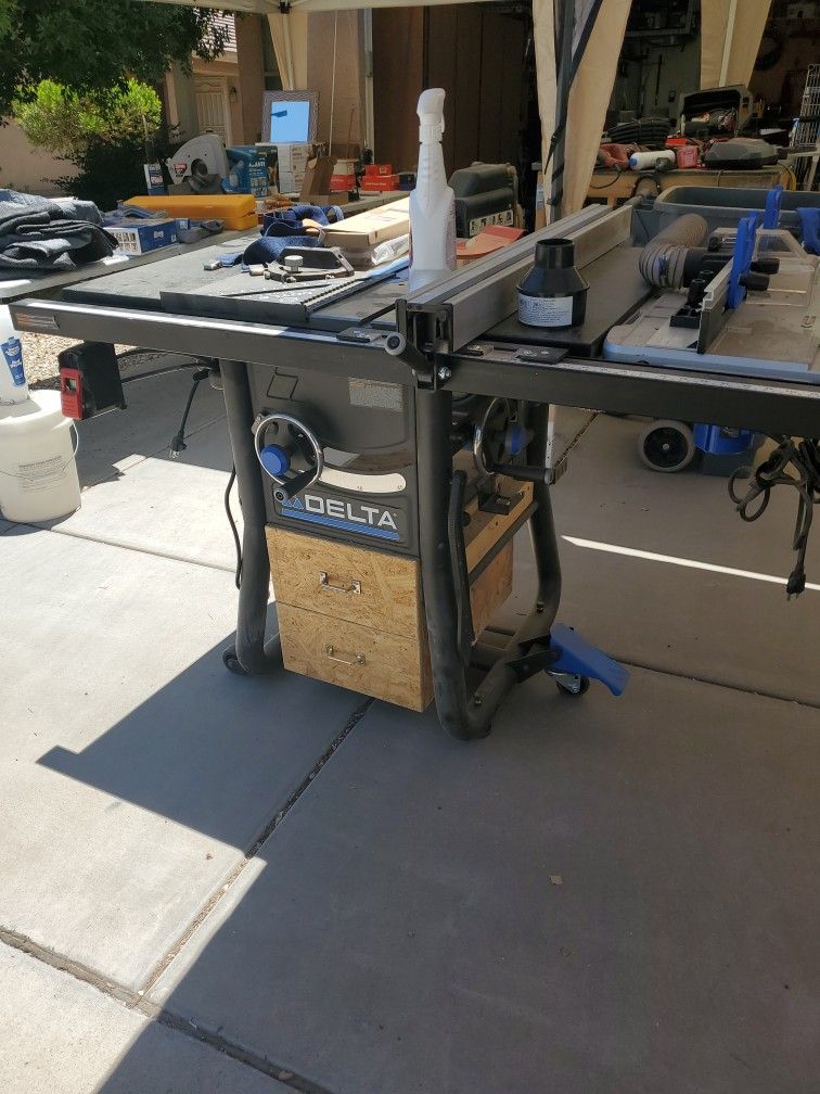10 inch Delta table saw with side router attached