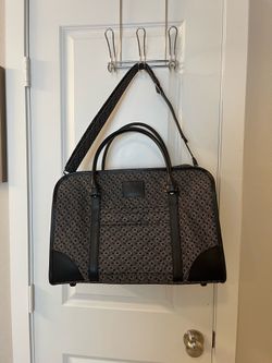 Joy Mangano Weekender Travel/Overnight Bag features a Black and Tan design