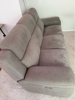 Power Reclining Sofa – 3 Seater – Dual Recliners & Adjustable Headrests. Excellent condition.Asking $550