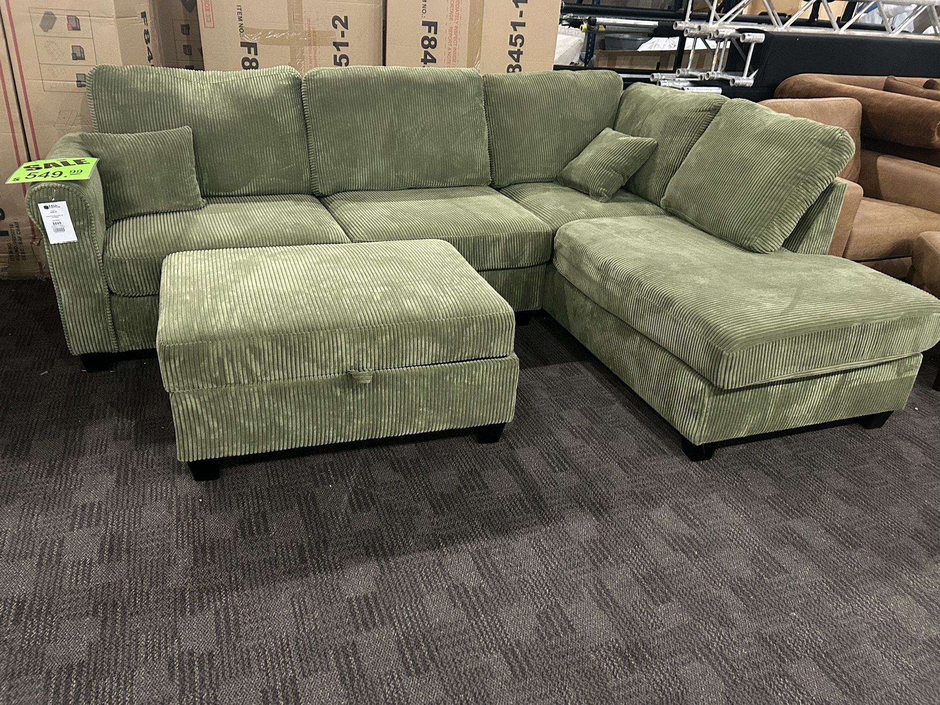 Sage Green sectional with storage ottoman. Other colors available
