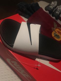 Nike slides 1yr