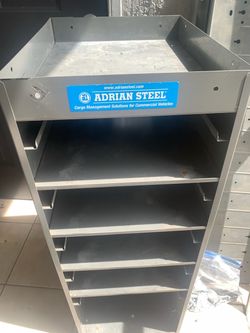 Adrian Steel Shelves and cabinet