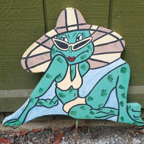 Yard Art. Cement. Rebar Stake pushes Into Ground