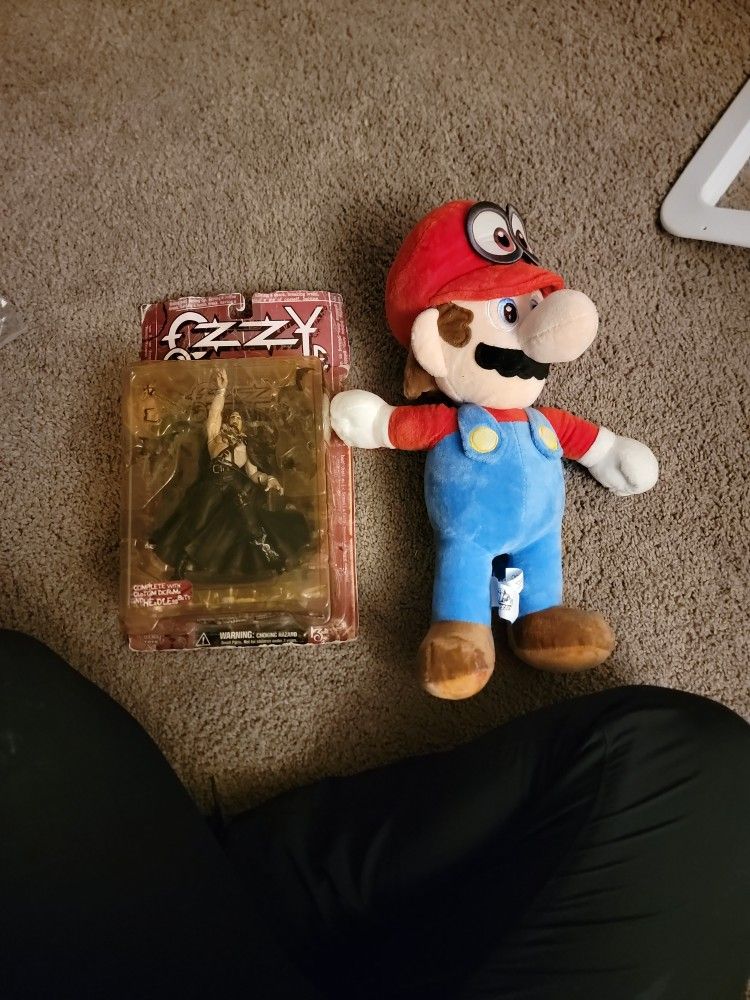 Ozzy Osbourne And Plush Mario