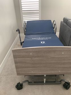 Motorized MED MIZER hospital bed